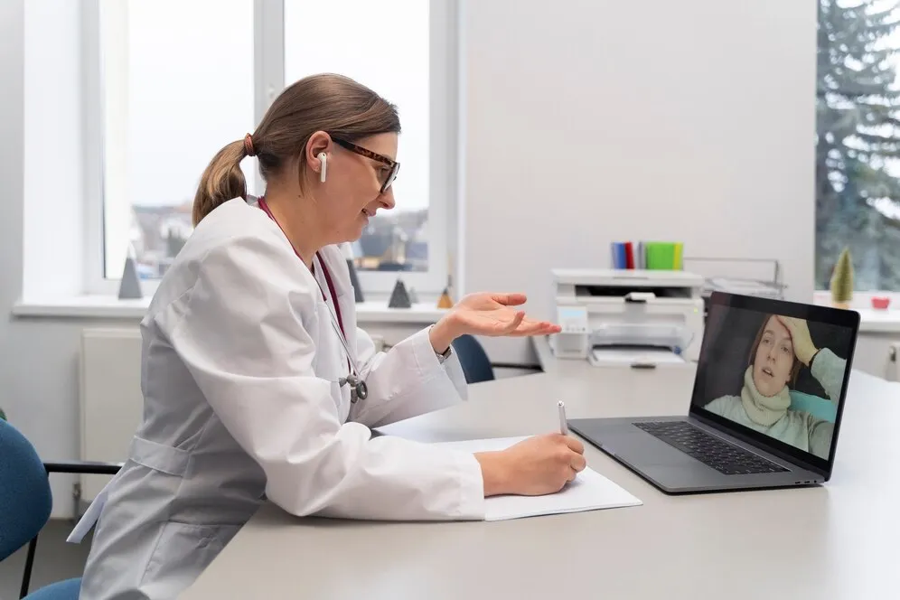 Illustration of a doctor and patient on a WebRTC telemedicine video call